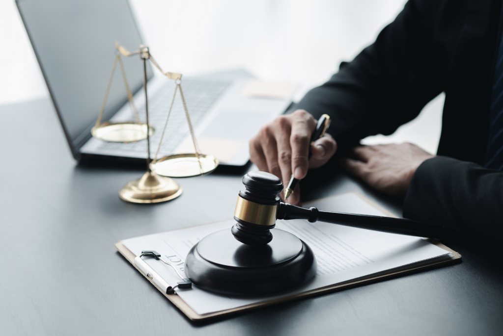 Office Scene of a Lawyer Reviewing Important Documents